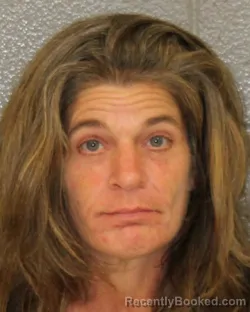 Mugshot of JESSICA HOPKINS MOORE booked in Mecklenburg County, North Carolina on May 20, 2026