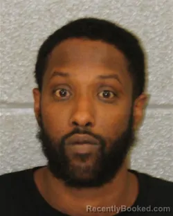 Mugshot of HASSAN ABDIRAHMAN SHIEKH booked in Mecklenburg County, North Carolina on May 21, 2026