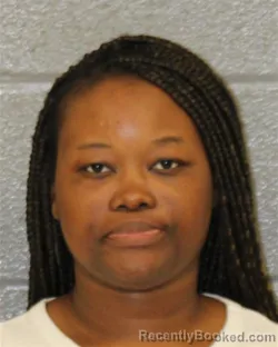 Mugshot of LAQUASHA SHAKURA-KASHAWN WEST booked in Mecklenburg County, North Carolina on May 21, 2026
