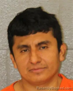 Mugshot of MARTIN EULALIO RUIZ-GARCIA booked in Mecklenburg County, North Carolina on May 24, 2026