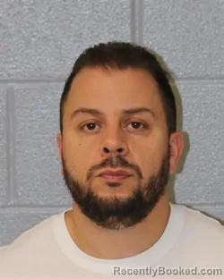 Mugshot of TAJ EDDINE DAHBI booked in Mecklenburg County, North Carolina on May 26, 2026