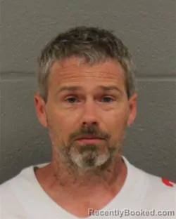 Mugshot of RUSSELL LEE DUTTON booked in Mecklenburg County, North Carolina on May 29, 2026