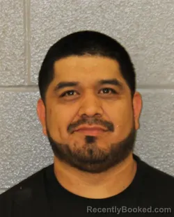 Mugshot of ALBERTO AGUILAR booked in Mecklenburg County, North Carolina on May 30, 2026