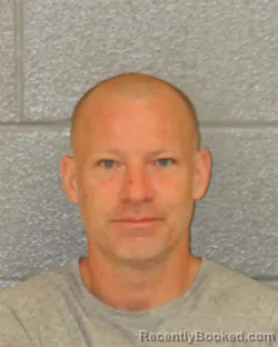 Mugshot of JASON ALAN BARNES booked in Mecklenburg County, North Carolina on May 30, 2026