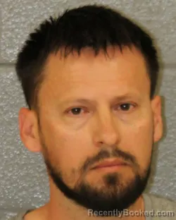 Mugshot of PAVEL ALEKSANDROVICH KALYUZHNYY booked in Mecklenburg County, North Carolina on May 31, 2026