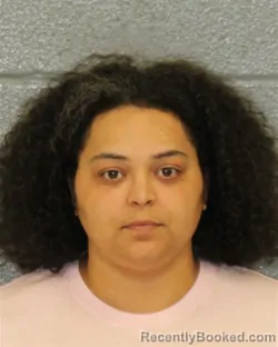 Mugshot of DOMINIQUE LASHAE STEWART booked in Mecklenburg County, North Carolina on May 31, 2026