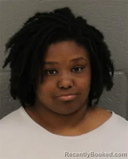 Mugshot of ARIANNA DOMINQUE WHITE booked in Mecklenburg County, North Carolina on June 4, 2026