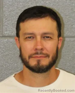 Mugshot of CHRISTOPHER MICHAEL GARCIA booked in Mecklenburg County, North Carolina on June 4, 2026