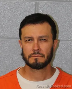 Mugshot of CHRISTOPHER MICHAEL GARCIA booked in Mecklenburg County, North Carolina on June 4, 2026