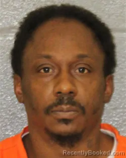 Mugshot of DAMARIO TELINSKA JENKINS booked in Mecklenburg County, North Carolina on April 23, 2026