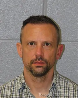 Mugshot of CHRISTOPHER CHARLES WEAVER booked in Mecklenburg County, North Carolina on June 8, 2026