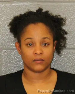 Mugshot of DAISHA DIXON booked in Mecklenburg County, North Carolina on June 9, 2026