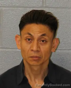Mugshot of HOA PHU NGUYEN booked in Mecklenburg County, North Carolina on June 9, 2026