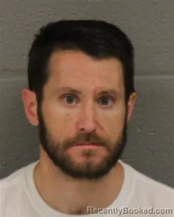 Mugshot of JOHN CHARLES CRONIN booked in Mecklenburg County, North Carolina on June 9, 2026