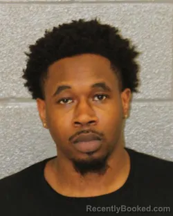 Mugshot of AHVION JERMAINE BUTLER booked in Mecklenburg County, North Carolina on June 10, 2026