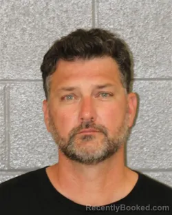 Mugshot of MICHAEL LESTER BUNDRA booked in Mecklenburg County, North Carolina on June 12, 2026
