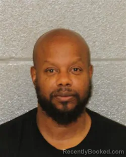 Mugshot of CARLTON OMARI FENTON booked in Mecklenburg County, North Carolina on June 13, 2026