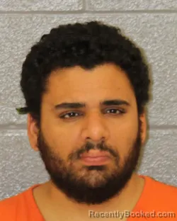 Mugshot of AHMED HEIKAL MOHAMED-RAMOS booked in Mecklenburg County, North Carolina on June 13, 2026