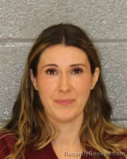 Mugshot of CHLOE MARIE SORIA booked in Mecklenburg County, North Carolina on June 13, 2026
