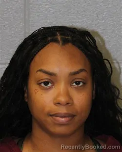 Mugshot of DEAUNDRA HARRIET WHITESIDES booked in Mecklenburg County, North Carolina on July 1, 2026