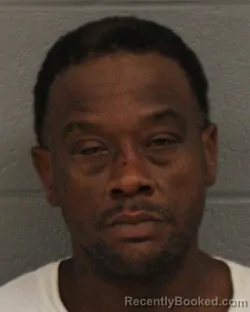 Mugshot of DOMINGO KEY MESCUDI booked in Mecklenburg County, North Carolina on July 7, 2026