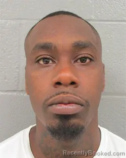 Mugshot of JWAN LAVORIOUS ISOM booked in Mecklenburg County, North Carolina on July 7, 2026