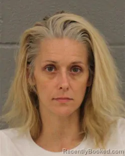 Mugshot of CARRIE ELIZABETH ARMSTRONG booked in Mecklenburg County, North Carolina on July 8, 2026