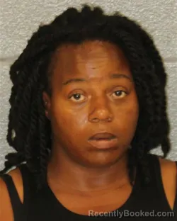 Mugshot of ASHLEY NICOLE SPENCER booked in Mecklenburg County, North Carolina on July 8, 2026