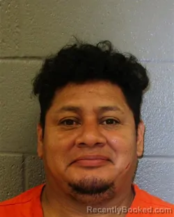 Mugshot of OLMAN ORLANDO ROMERO-MENDEZ booked in Mecklenburg County, North Carolina on July 9, 2026