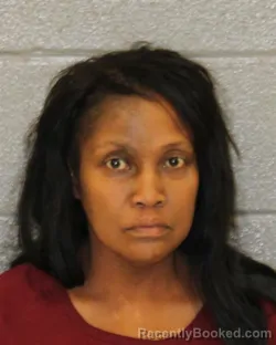 Mugshot of CLARA MONIQUE FLORES-BANEGAS booked in Mecklenburg County, North Carolina on July 10, 2026
