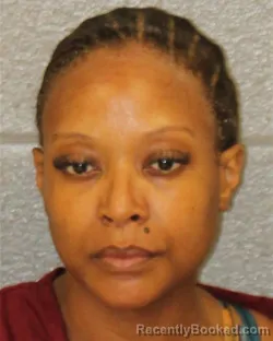 Mugshot of SORAYA MARTIAL booked in Mecklenburg County, North Carolina on July 14, 2026