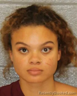 Mugshot of JASMYNE GEMMA WOOLCOCK booked in Mecklenburg County, North Carolina on July 22, 2026