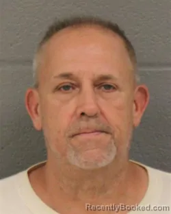 Mugshot of THOMAS EDWARD MOORE booked in Mecklenburg County, North Carolina on August 4, 2026