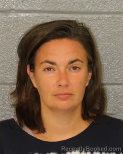 Mugshot of Catherine Helen Dixon booked in Mecklenburg County, North Carolina on August 5, 2026