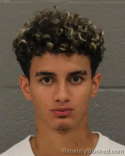 Mugshot of Snayder Fernando Munoz booked in Mecklenburg County, North Carolina on August 6, 2026