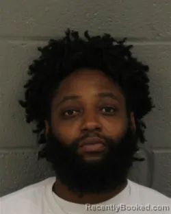 Mugshot of Alexander Montes Brown booked in Mecklenburg County, North Carolina on August 7, 2026