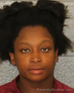 Mugshot of Quasha Nicole Simmons booked in Mecklenburg County, North Carolina on August 8, 2026