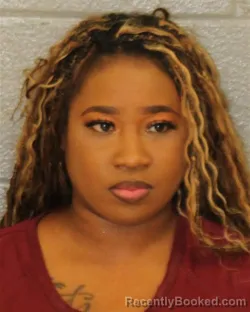 Mugshot of Deja Nicole Morrow booked in Mecklenburg County, North Carolina on August 9, 2026