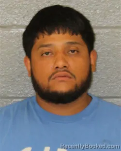 Mugshot of Victor Edgardo Garcia-Santiago booked in Mecklenburg County, North Carolina on August 10, 2026