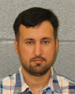 Mugshot of Adeel Rabbani booked in Mecklenburg County, North Carolina on August 10, 2026