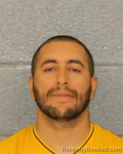 Mugshot of Amar Lotmani booked in Mecklenburg County, North Carolina on August 11, 2026