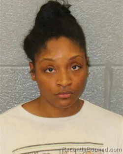 Mugshot of Benita Michelle Walker booked in Mecklenburg County, North Carolina on August 12, 2026