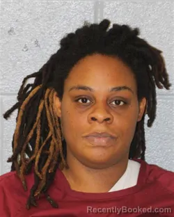 Mugshot of Jashawna Attuyah-Sharee Jackson booked in Mecklenburg County, North Carolina on August 14, 2026