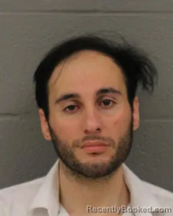 Mugshot of Yavuzcan John Akiska booked in Mecklenburg County, North Carolina on August 15, 2026