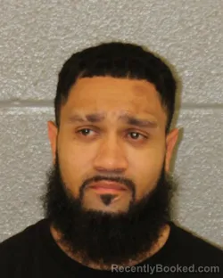 Mugshot of Justin Garcia booked in Mecklenburg County, North Carolina on August 15, 2026