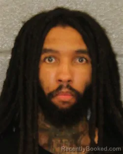 Mugshot of Devin D'andrae Tomlin booked in Mecklenburg County, North Carolina on August 16, 2026