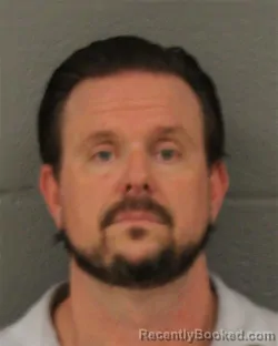 Mugshot of Jesse Wade Olive booked in Mecklenburg County, North Carolina on August 20, 2026