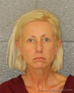 Mugshot of Kari Liisa Caron booked in Mecklenburg County, North Carolina on August 19, 2026