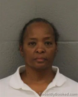 Mugshot of Dinah Teresa Reid booked in Mecklenburg County, North Carolina on August 21, 2026