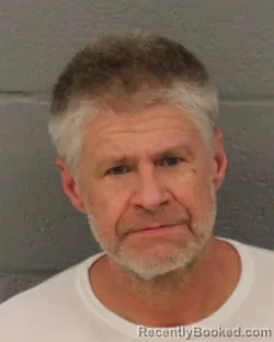 Mugshot of Jason Mead Carnes booked in Mecklenburg County, North Carolina on August 22, 2026
